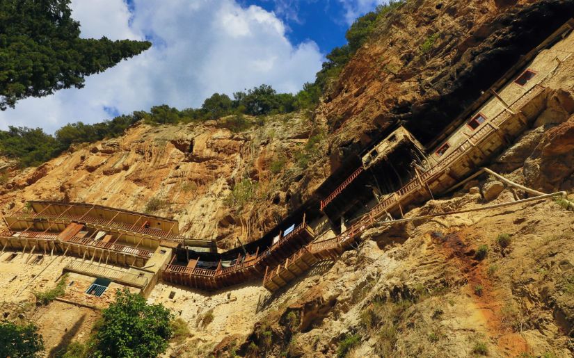 Nature and faith carved into rock at Moni Prodromou.